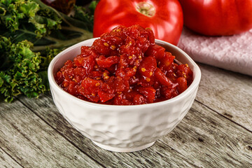 Diced ripe tomato with sauce