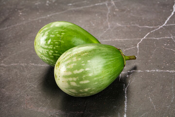 Ripe green mini eggplants heap