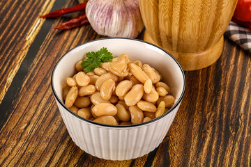Baked white canned beans in the bowl