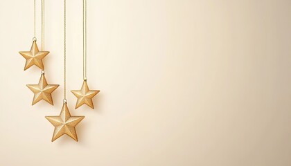 Elegant golden stars hanging against a soft beige background, creating a festive atmosphere