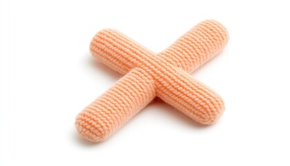 Soft, orange plush toy cross on a white background, ideal for pet play or decorative use