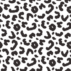 Abstract animal monochrome seamless pattern.Dalmatian, leopard or ocelot print allover background. Jaguar fur continuous vector hand drawn ornament. Surface pattern design camouflage texture motif.