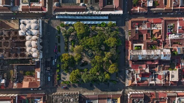 Top down view of Central Park, Antigua Guatemala. Static drone timelapse shot, vertical video