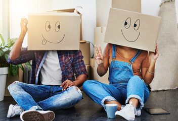 Emoji, moving and couple with boxes, playful and mortgage with real estate, bonding together and house.People and man with woman on floor, cardboard and funny with love, comic and property investment