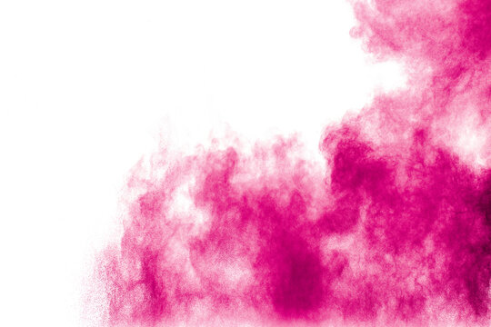 Pink cloud of powdery substance is floating in the air. The color is vibrant and eye-catching, and the texture is fluffy and powdery.