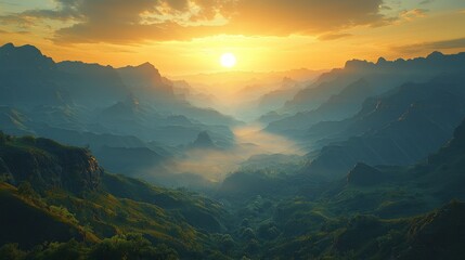 Fototapeta premium Golden sunset over misty mountain valley
