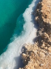 Obraz premium Turquiose water of oasis salt lake in Siwa, Egypt