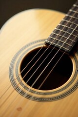 Obraz premium Close-up view of an acoustic guitar's soundhole and strings, showcasing the intricate detail and craftsmanship of the instrument's body