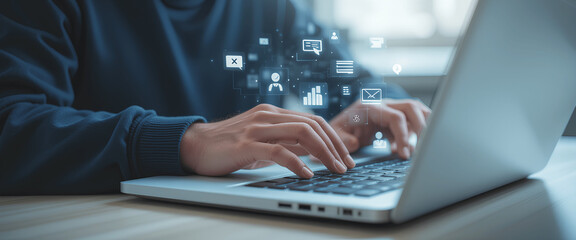 Close-up of hands typing on laptop with futuristic digital overlay of social media marketing and business network technology
