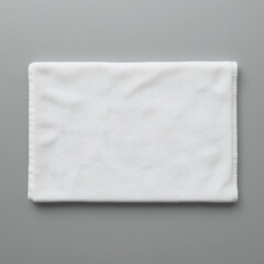 White cotton bath towel mockup – realistic wrinkled fabric texture, flat lay isolated on neutral background