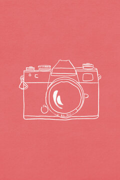 Minimalist illustration of a vintage film camera capturing memories