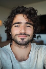 Obraz premium Casual male portrait at home with soft pastel colors for social media or profile picture use