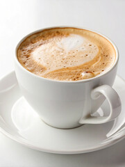 Coffee Break Bliss: A warm, inviting cup of latte with a heart-shaped foam design, perfectly capturing the essence of a delightful coffee break.