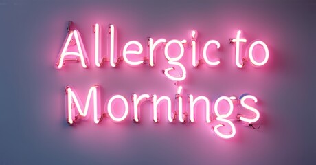 Neon light sign displaying Allergic to Mornings in bright warm pink hues glowing against dark background with sleek curves creating a striking contrast and vibrant energy