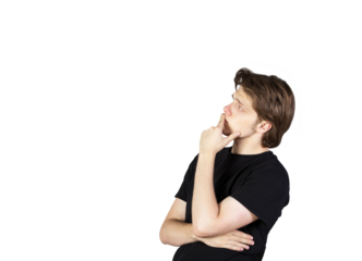 A young man in ashirt, posing thoughtfully with hand on chin, isolated on a clean white background. Concept of reflection and decision-making