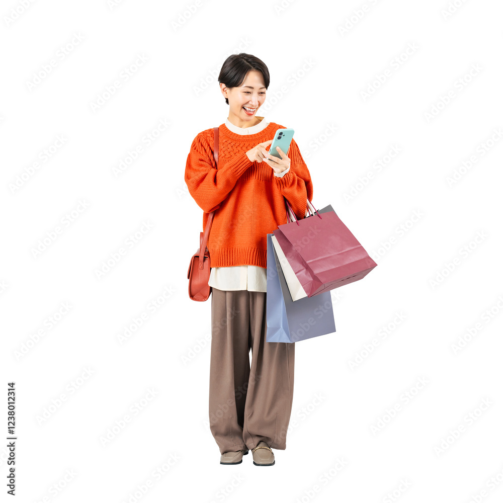 Poster ショッピングバッグを持ってスマホを使うミドル女性　手作業で精密に切り抜いた背景透過全身写真png