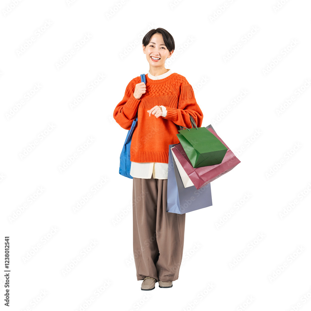 Aufkleber ショッピングバッグを持って歩くおしゃれなミドル女性　手作業で精密に切り抜いた背景透過全身写真png