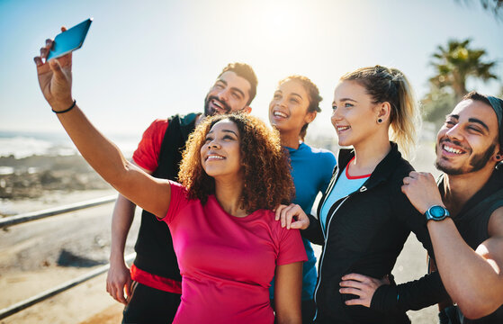 Fitness, selfie and group of happy friends in nature to post picture for wellness, health and workout on social media. Exercise team, people and photo together for memory, sports or training at beach