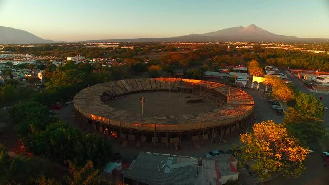 Aerial view of the Petatera in Villa de Alvarez, showing the Colima volcano