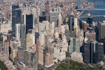 Fototapeta premium Aerial view of New York City financial district skyline in daylight.