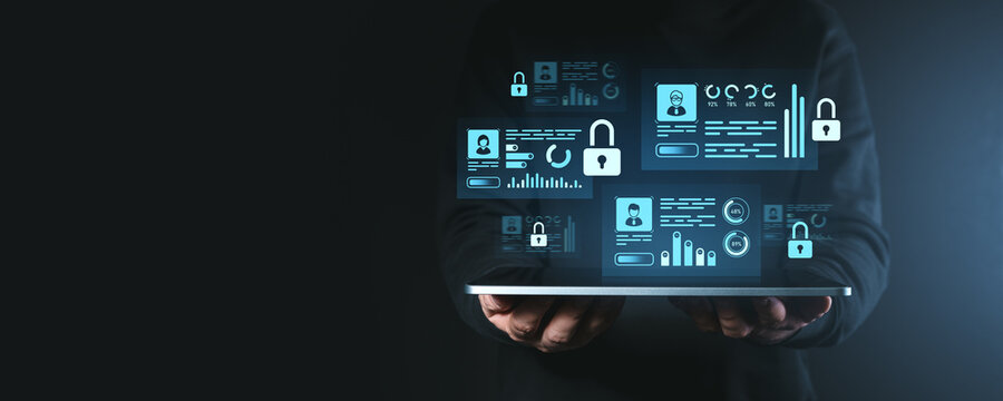 Digital security icons displayed on a tablet in a dark environment.