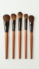 Fototapeta premium Traditional crafts, Elegant Makeup Brushes Displayed on a Neutral Background for Beauty and Fashion Themes