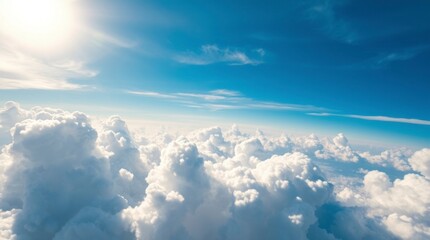 Fototapeta premium Stunning Aerial View of Fluffy White Clouds and Blue Sky