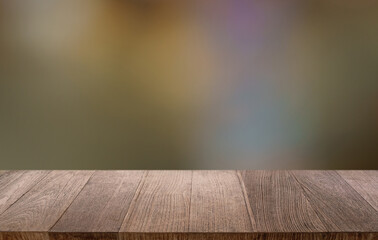 Empty wood table top and blur of restaurant background selective focus product display