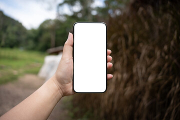 Smart phone mockup. Women hands holding cell telephone blank copy space screen smartphone blank white screen isolated technology concept.