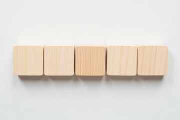 Obraz premium Five blank wooden blocks on a clean white background. Minimalist, template, copy space concept.