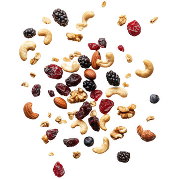Assorted nuts and dried berries mix, including cashews, almonds, walnuts, cranberries, blackberries, and blueberries, scattered on a transparent background Concept of healthy snack, trail mix, and nat