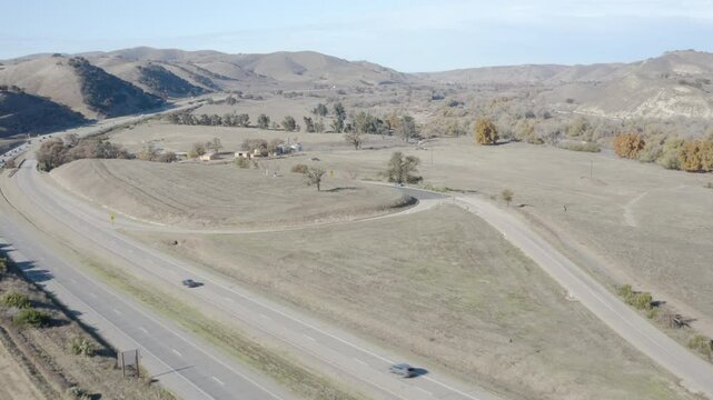 4K flight over highway 101 and surrounding ranch lands as it heads north outside the town of Bradley California.