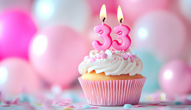 Happy Birthday 33th with a cupcake and candles