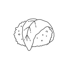 A piece of food with a leaf on top