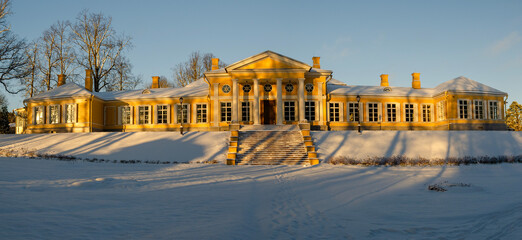 The main building of the ancient Monrepos estate on a sunny morning.