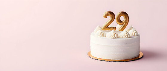 Happy Birthday 29th with gold letters on a light pink background