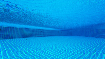 underwater photo of the swimming pool Blue swimming pool for activities, exercise and health care with swimming sports.	