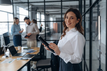 Positive facial expression. Business people are working in the office