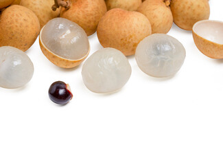 Top view Fresh longan fruit with seed on white background.