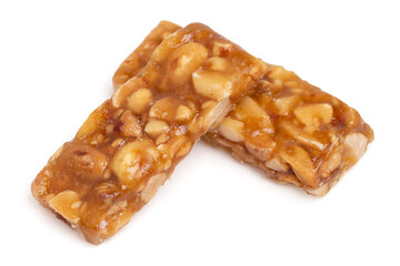 Top view honey bars with peanuts, sesame isolated on white background.