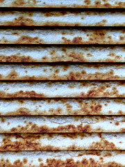 A Close up of Rusty Corrigated Industrial Iron Lined Metal Background