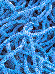 Close up of industrial blue construction rope thick and abstract