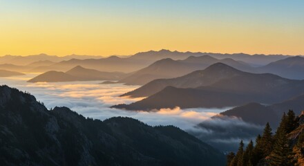 Fototapeta premium Serene Sunrise Mountain Landscape with Fog and Peaks