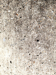 Close up of heavily weather concrete wall with cracks and moss corrosion Grungy Masionary Background
