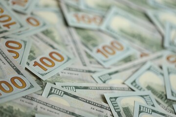 Big amount of american USD hunderd dollar bills banknotes close up