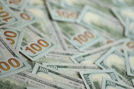 Big amount of american USD hunderd dollar bills banknotes close up