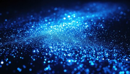 Mesmerizing blue light particles form a cosmic pattern in dark space