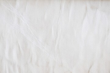 White wrinkled paper glued to a wall. Abstract banner template design. Closeup texture background.