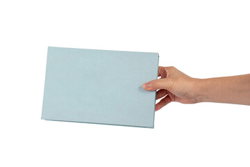 Obraz premium Blank blue book cover in hand on transparent background.