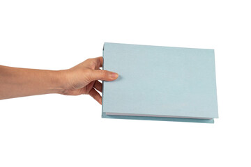 Blank blue book cover in hand on transparent background.